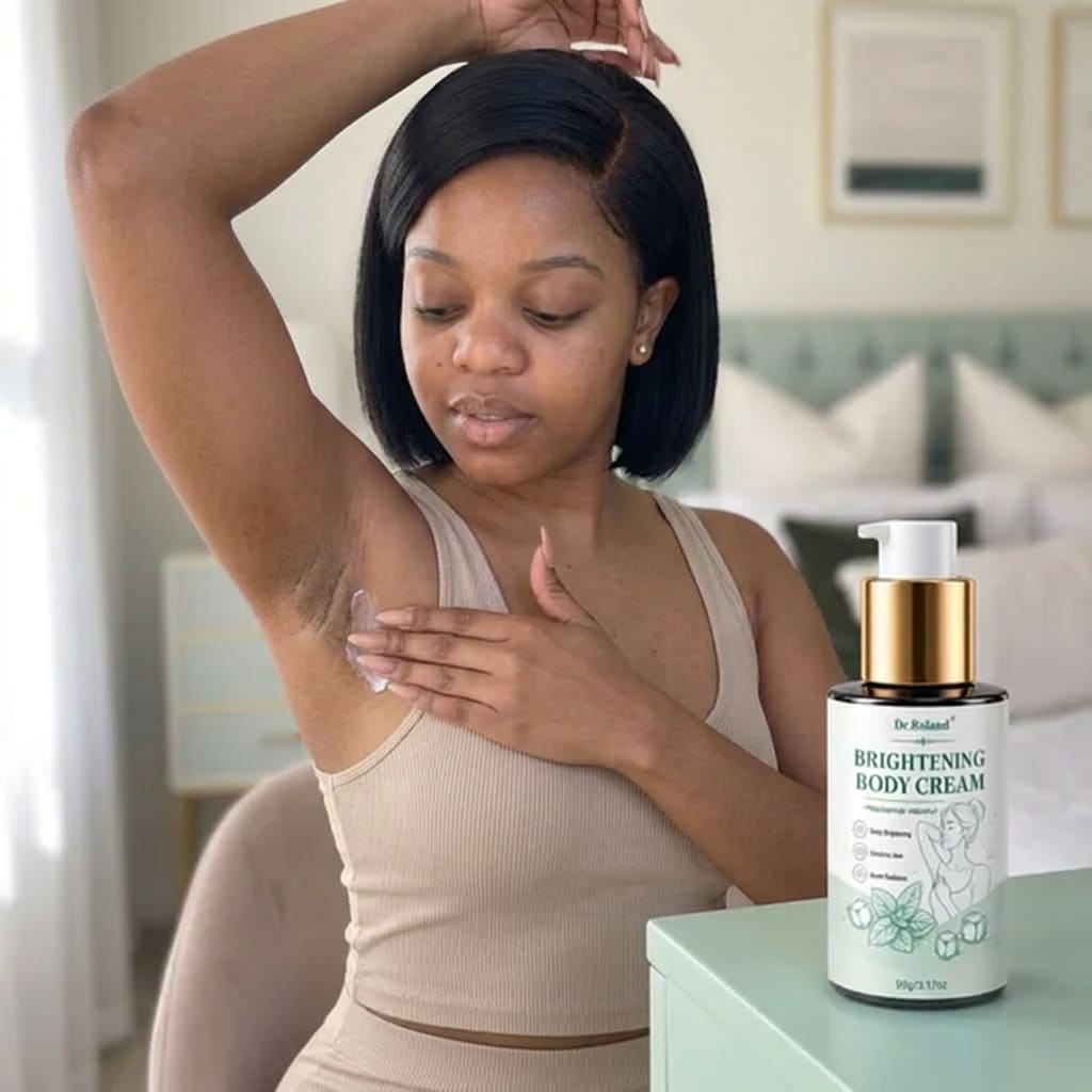 Woman applying Dr. Roland brightening cream to dark underarm skin
